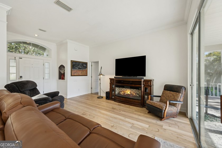 THIS BEAUTIFULLY UPDATED THREE-BEDROOM HOME IN OSPREY COVE IS - photo 13