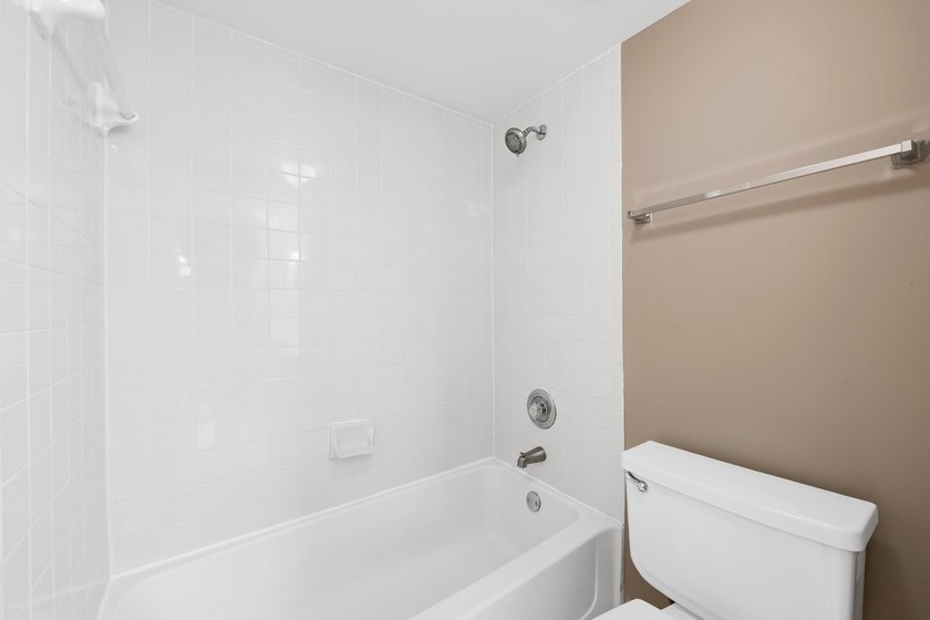 Charming second-floor 2BR/2BA condo in Oakland Forest with - photo 13