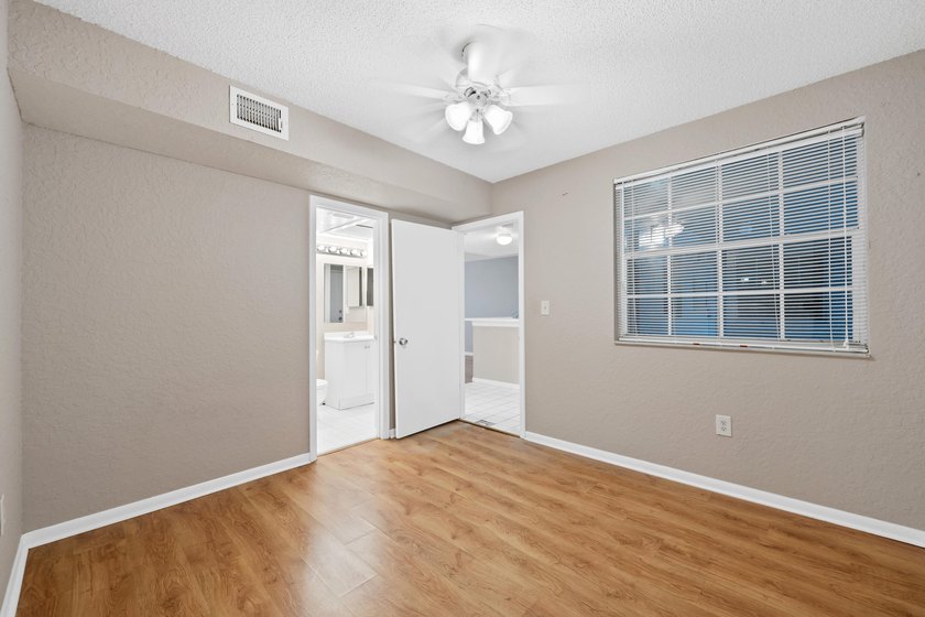 Charming second-floor 2BR/2BA condo in Oakland Forest with - photo 17