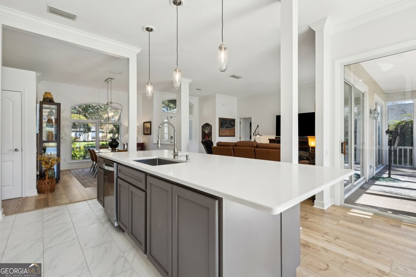 THIS BEAUTIFULLY UPDATED THREE-BEDROOM HOME IN OSPREY COVE IS - photo 19