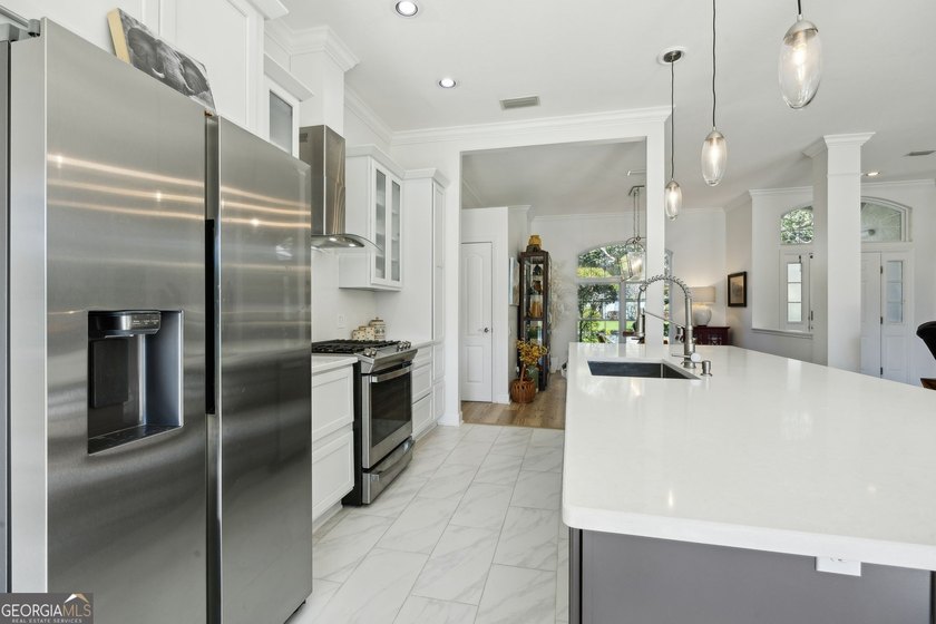 THIS BEAUTIFULLY UPDATED THREE-BEDROOM HOME IN OSPREY COVE IS - photo 20