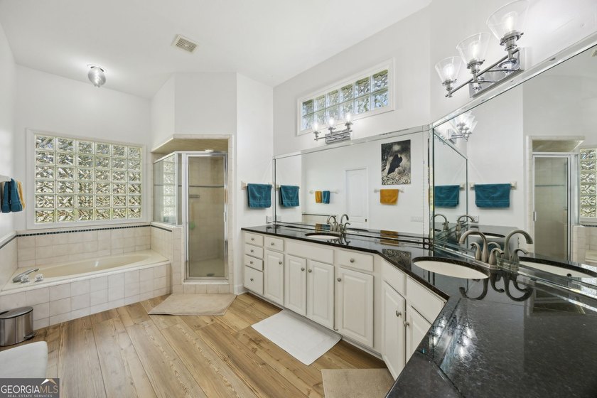THIS BEAUTIFULLY UPDATED THREE-BEDROOM HOME IN OSPREY COVE IS - photo 29