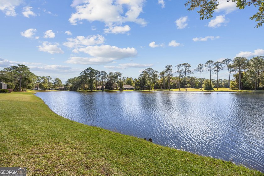 THIS BEAUTIFULLY UPDATED THREE-BEDROOM HOME IN OSPREY COVE IS - photo 44