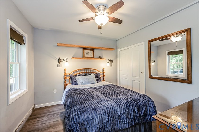 This beautiful lakefront home on over an acre features an open - photo 36