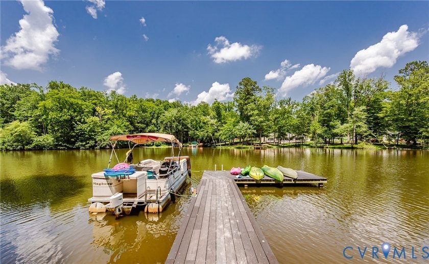 This beautiful lakefront home on over an acre features an open - photo 50