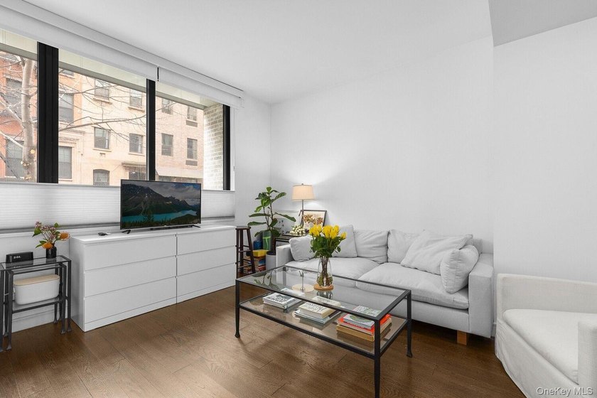Welcome to **211 East 13th Street, Unit 1C** - a beautifully - photo 3
