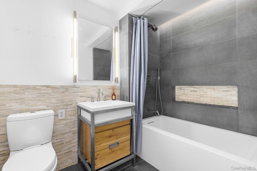 Welcome to **211 East 13th Street, Unit 1C** - a beautifully - photo 5