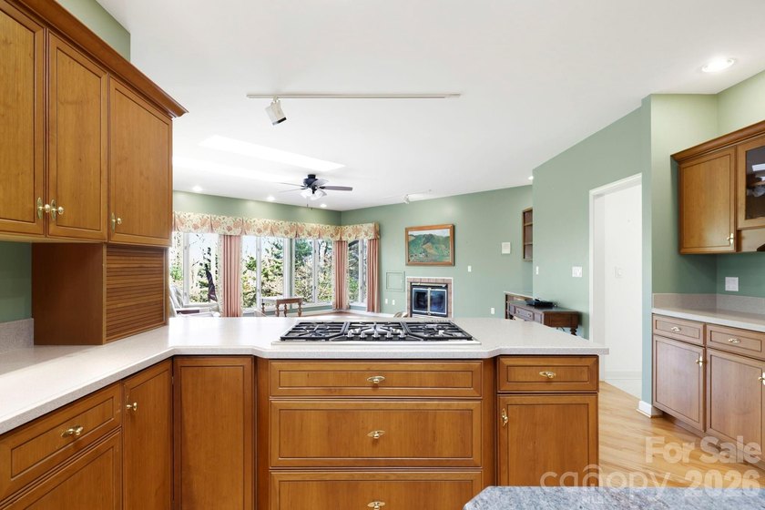 Step into this Kenmure home that feels like a private retreat - photo 11