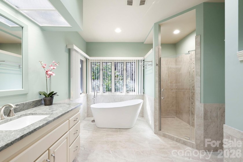 Step into this Kenmure home that feels like a private retreat - photo 25