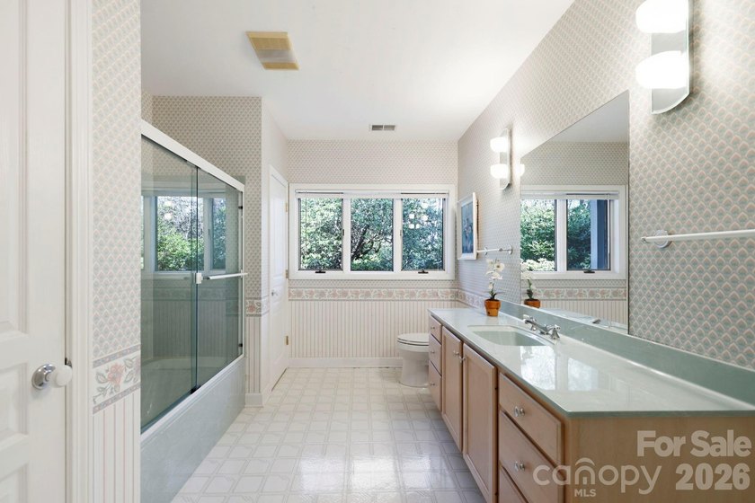 Step into this Kenmure home that feels like a private retreat - photo 36