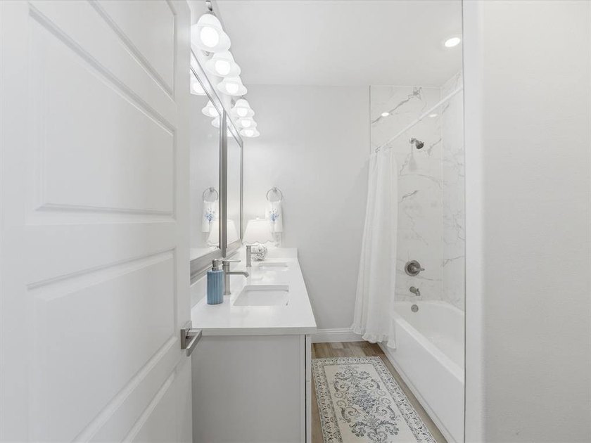 Welcome to this stunning 3 bedroom, 2 bathroom home nestled - photo 17
