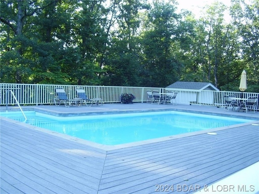 Four Seasons Building Lot that is fairly level and wooded - photo 7