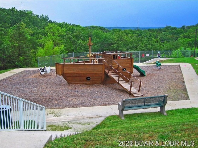 Four Seasons Building Lot that is fairly level and wooded on 1 - photo 8