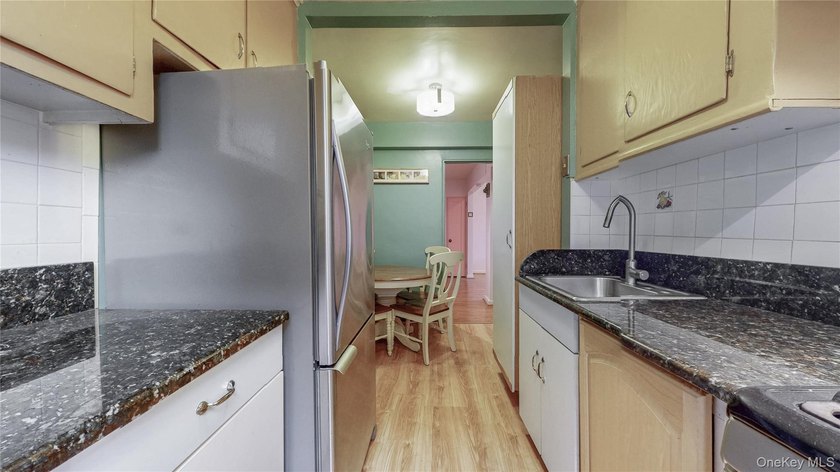 Welcome to Unit 4H, a bright and generously sized one-bedroom - photo 5