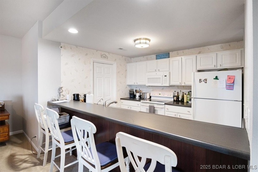 Walk-in from the Parking Lot! End Unit! Turn-Key! Great views of - photo 28
