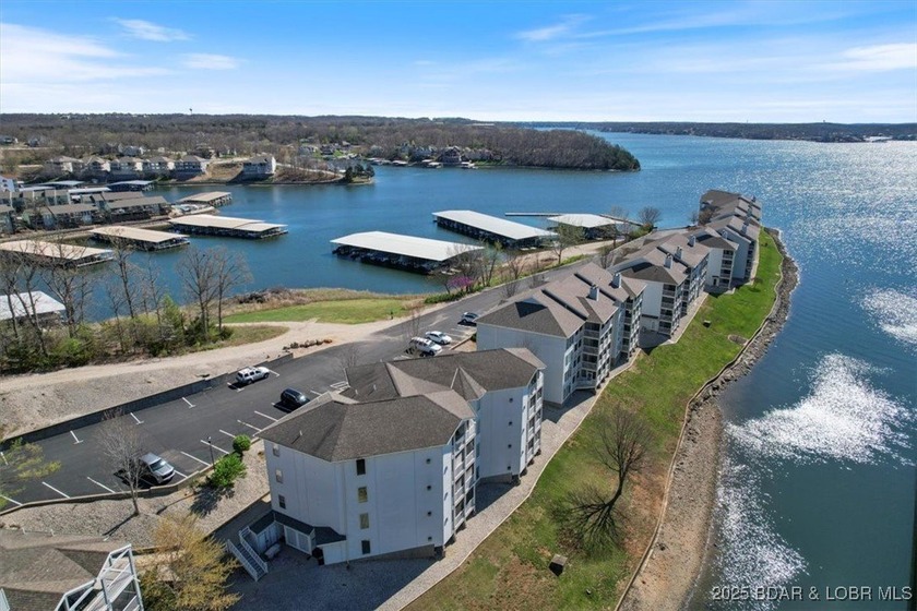 Walk-in from the Parking Lot! End Unit! Turn-Key! Great views of - photo 31