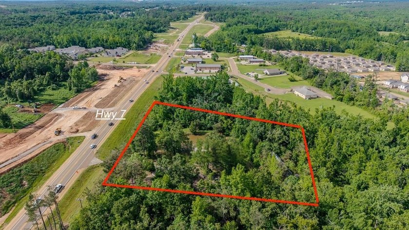 DEVELOPMENT OPPORTUNITY! This 3.16 acre parcel is located inside - photo 2