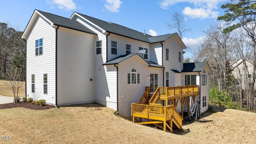 Situated on a premium 0.89-acre lot in Wake Forest's highly - photo 10