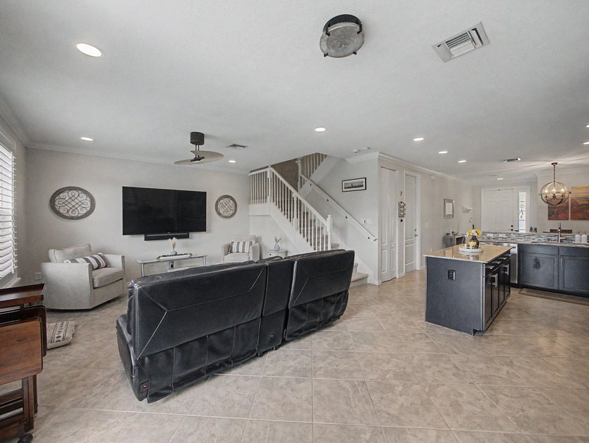 Experience elevated and tranquil waterfront living in this - photo 11