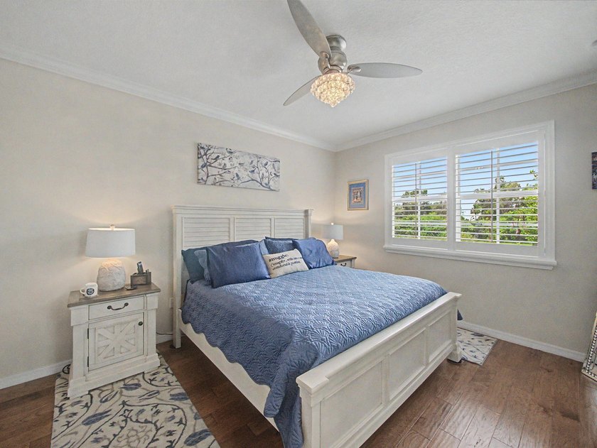 Experience elevated and tranquil waterfront living in this - photo 13