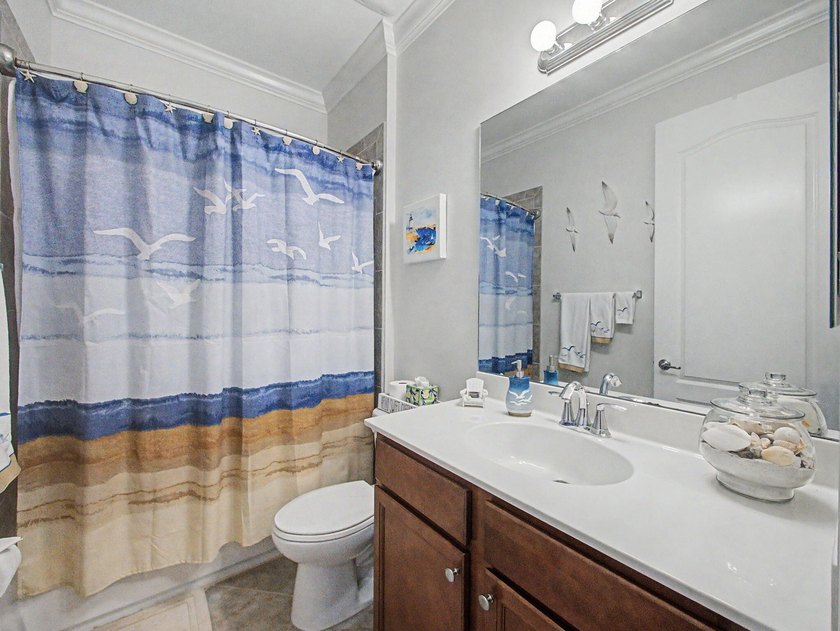 Experience elevated and tranquil waterfront living in this - photo 19