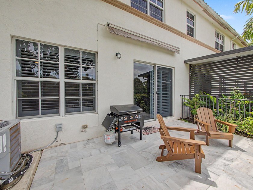 Experience elevated and tranquil waterfront living in this - photo 22