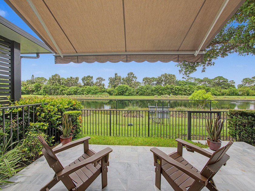 Experience elevated and tranquil waterfront living in this - photo 24