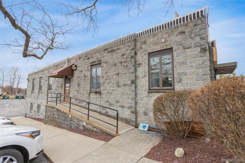 This well-maintained 5,758-square-foot commercial building is - photo 35