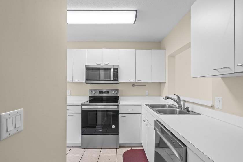 Welcome to this beautifully updated second floor condo featuring - photo 12