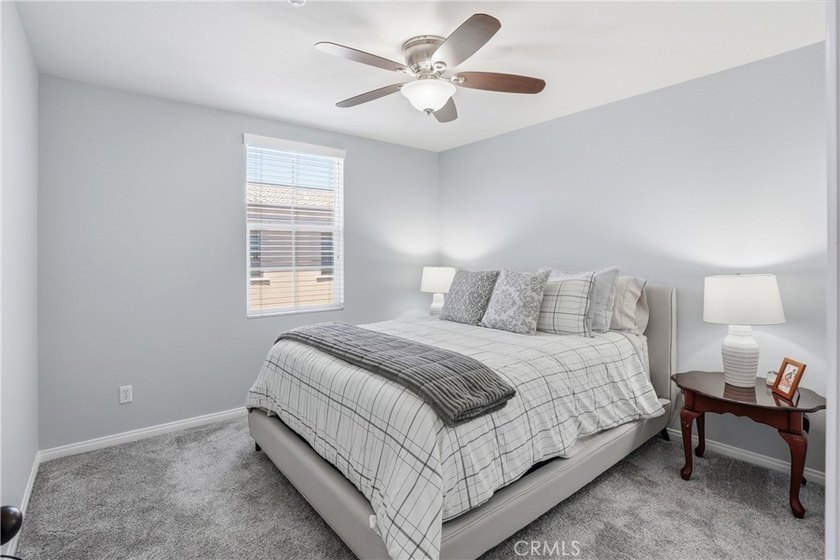 Welcome to this highly upgraded three-bedroom residence in the - photo 15