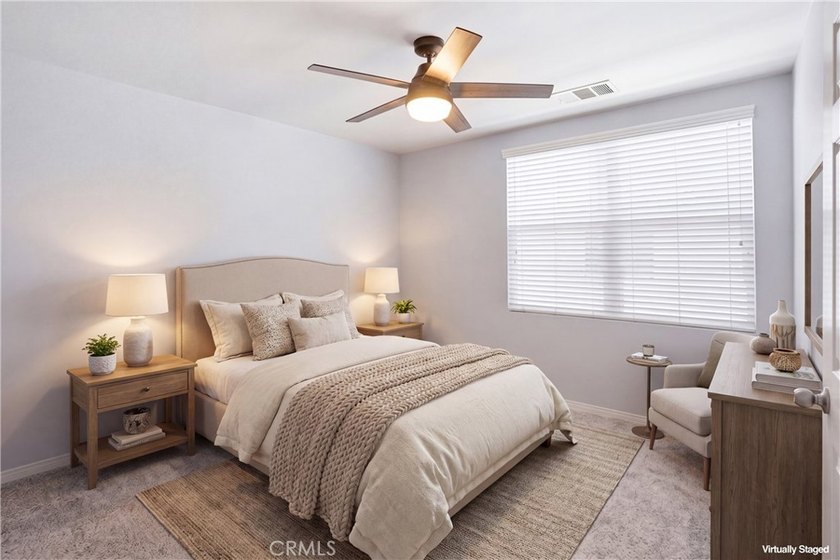 Welcome to this highly upgraded three-bedroom residence in the - photo 18