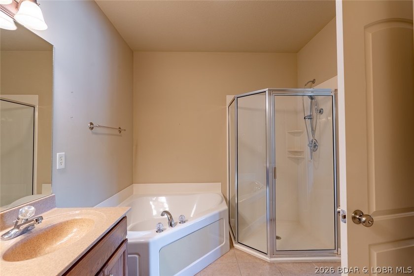 Experience low-maintenance lake living in this well-maintained - photo 11
