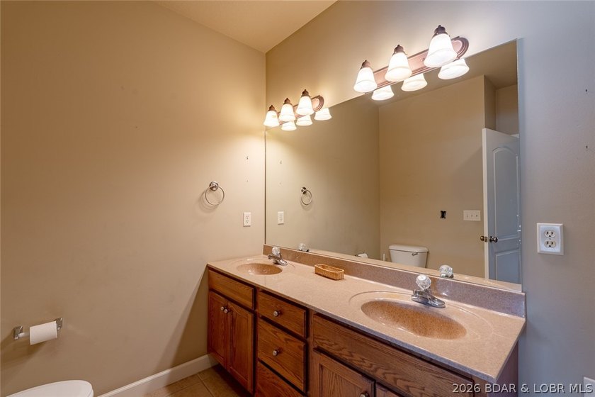 Experience low-maintenance lake living in this well-maintained - photo 12