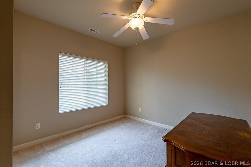 Experience low-maintenance lake living in this well-maintained - photo 13