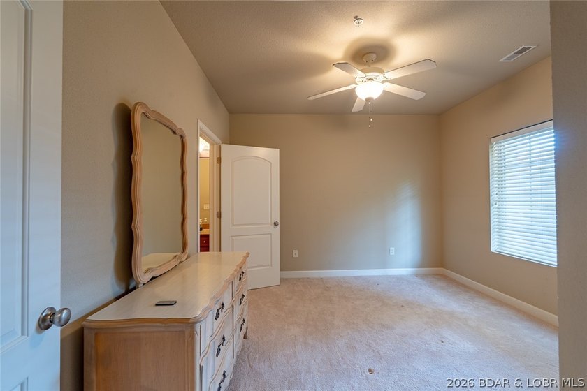 Experience low-maintenance lake living in this well-maintained - photo 15