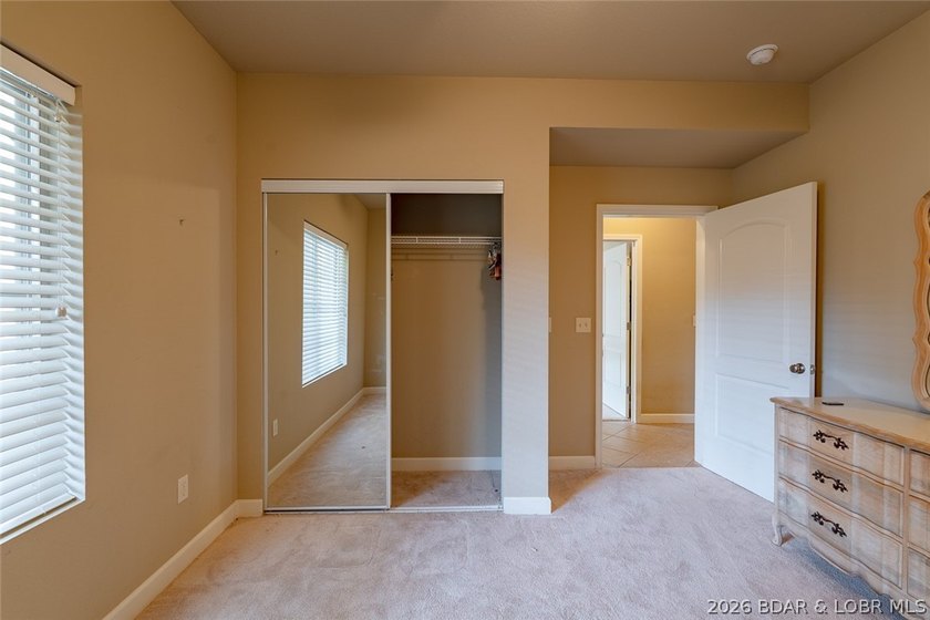 Experience low-maintenance lake living in this well-maintained - photo 16