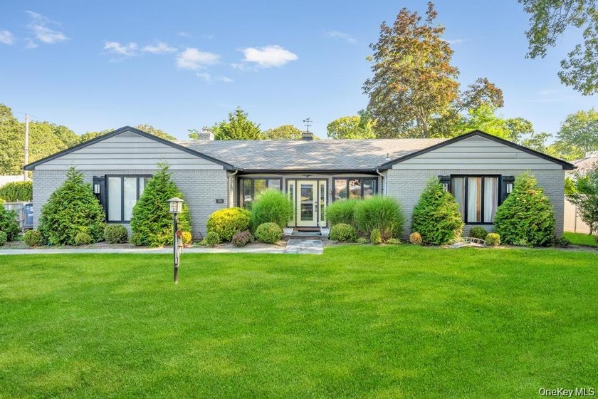 This beautiful ranch is set on .33 of an acre - photo 2