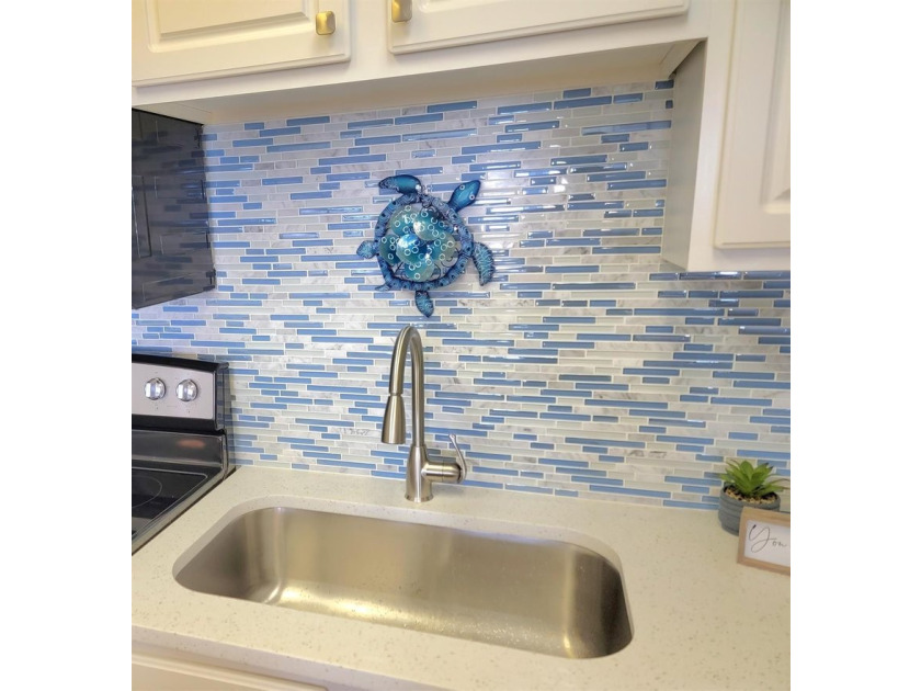 Gulf front 2-bedroom 2 bath condo. The upgrades have paid off in - photo 4