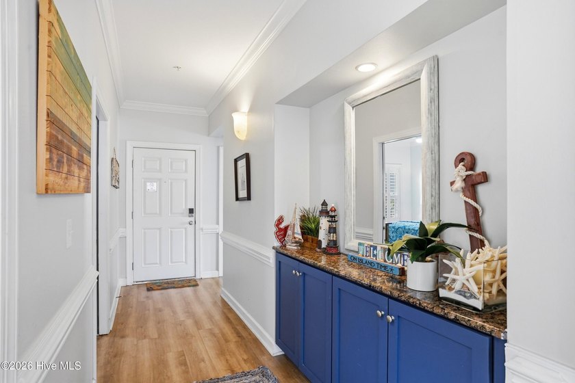 This beautifully updated ocean villa stands out from the rest in - photo 5