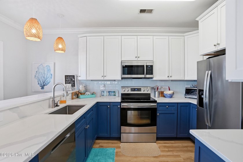 This beautifully updated ocean villa stands out from the rest in - photo 9