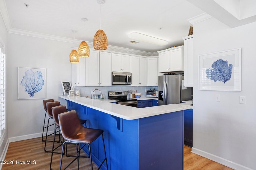 This beautifully updated ocean villa stands out from the rest in - photo 10