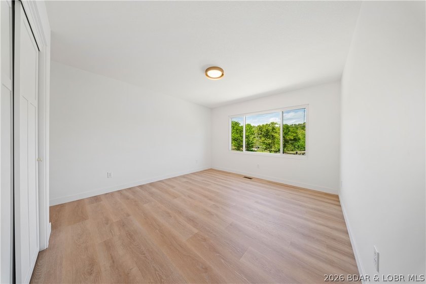 Cove location with 100 feet of lakefront, this beautifully - photo 14