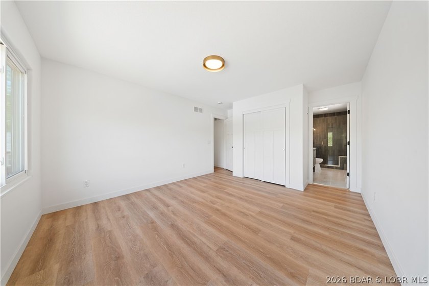 Cove location with 100 feet of lakefront, this beautifully - photo 15