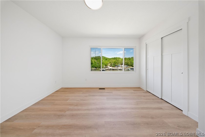 Cove location with 100 feet of lakefront, this beautifully - photo 18