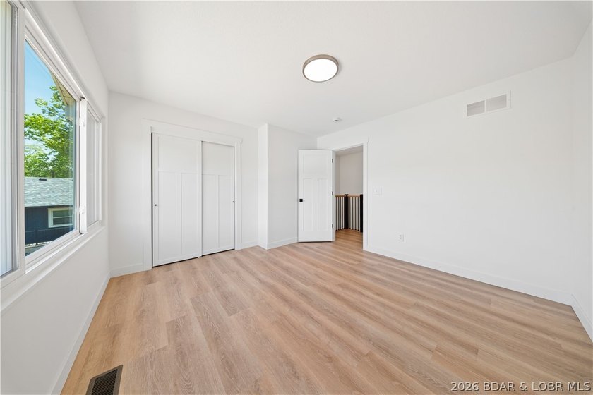 Cove location with 100 feet of lakefront, this beautifully - photo 19