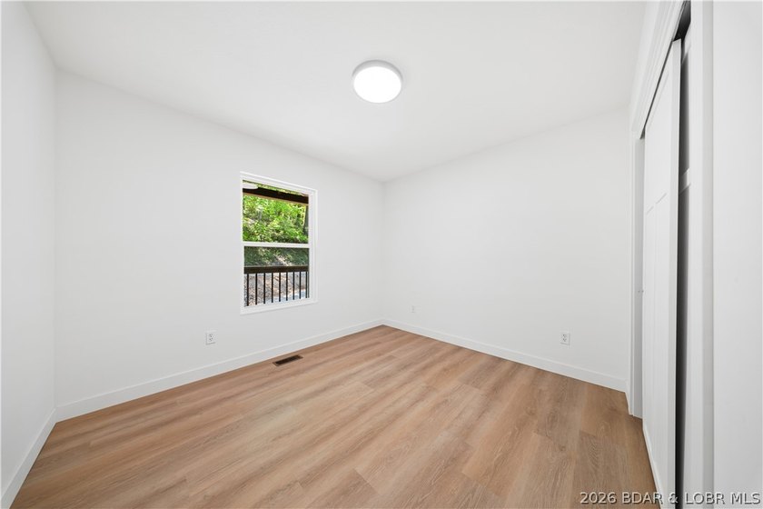 Cove location with 100 feet of lakefront, this beautifully - photo 22
