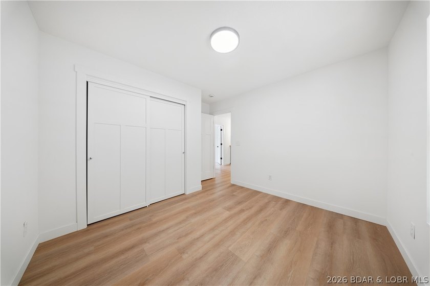 Cove location with 100 feet of lakefront, this beautifully - photo 23