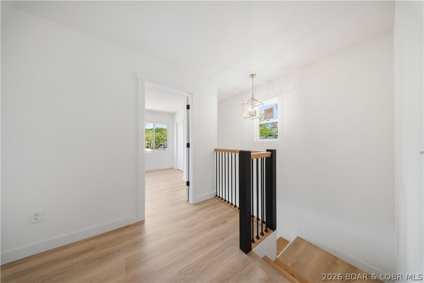 Cove location with 100 feet of lakefront, this beautifully - photo 25