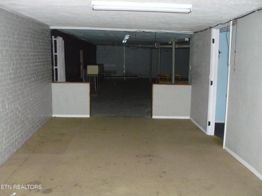 First time on the market, this building has entrance from Main - photo 27
