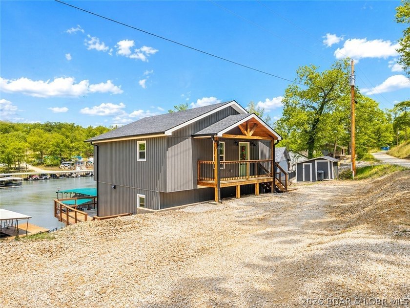 Cove location with 100 feet of lakefront, this beautifully - photo 30
